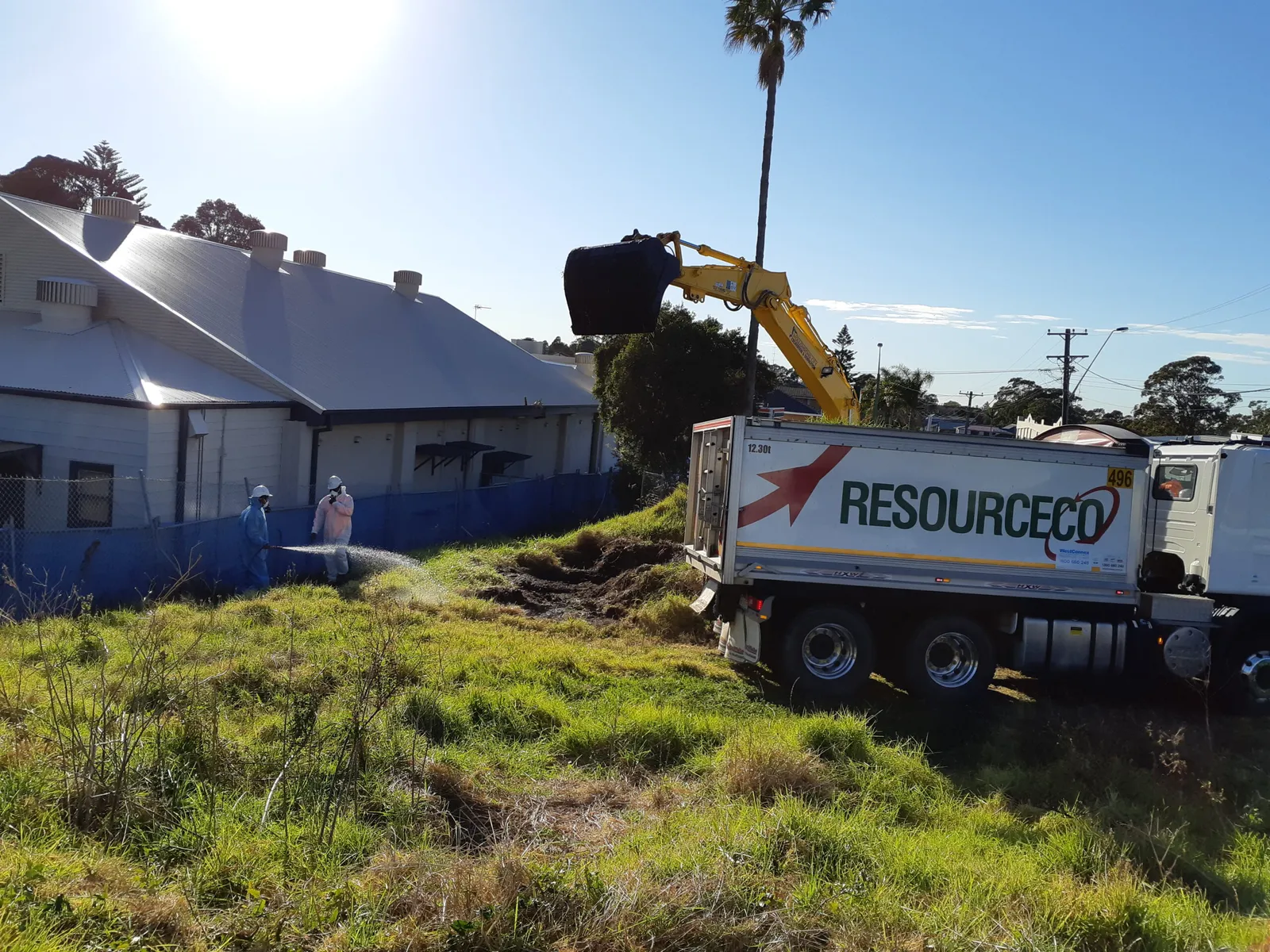 WCED crew safely removing non-friable asbestos from a Wollongong site